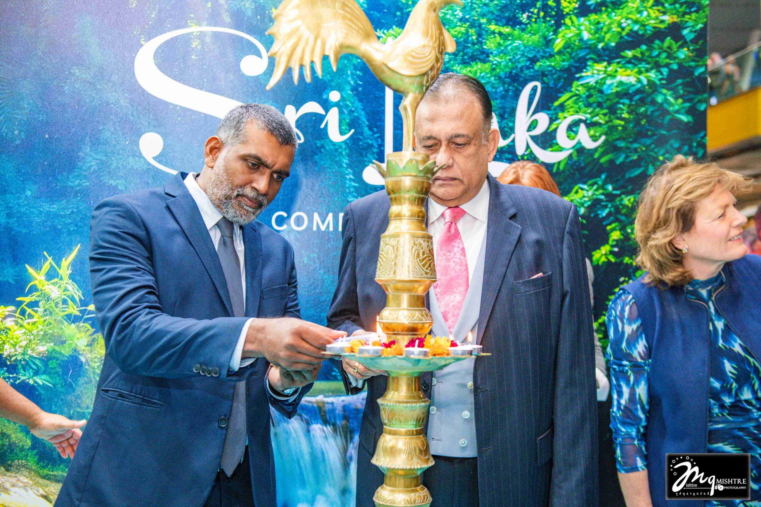 Mr . Buddhika Hewawasam , Chairman Sri Lanka Tourism , taking part in lighting the oil lamp